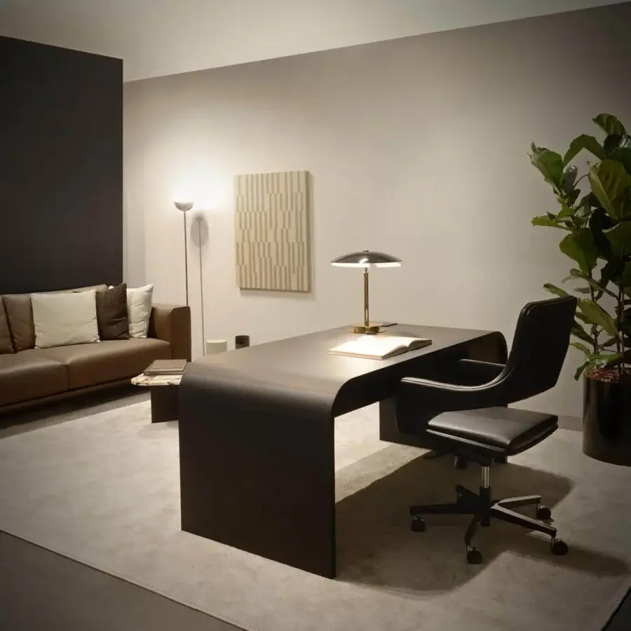 Distinguished 4 Mariani Nami desk with uniquely curved saddle leather and veneered wood, exhibiting a sleek matte finish