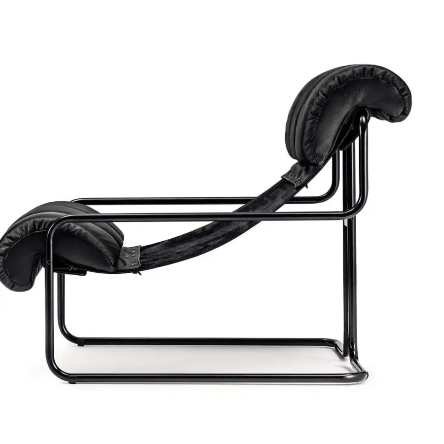Superior 4 Mariani Tucroma lounge chair with black metal tubing supporting comfortable black leather seating