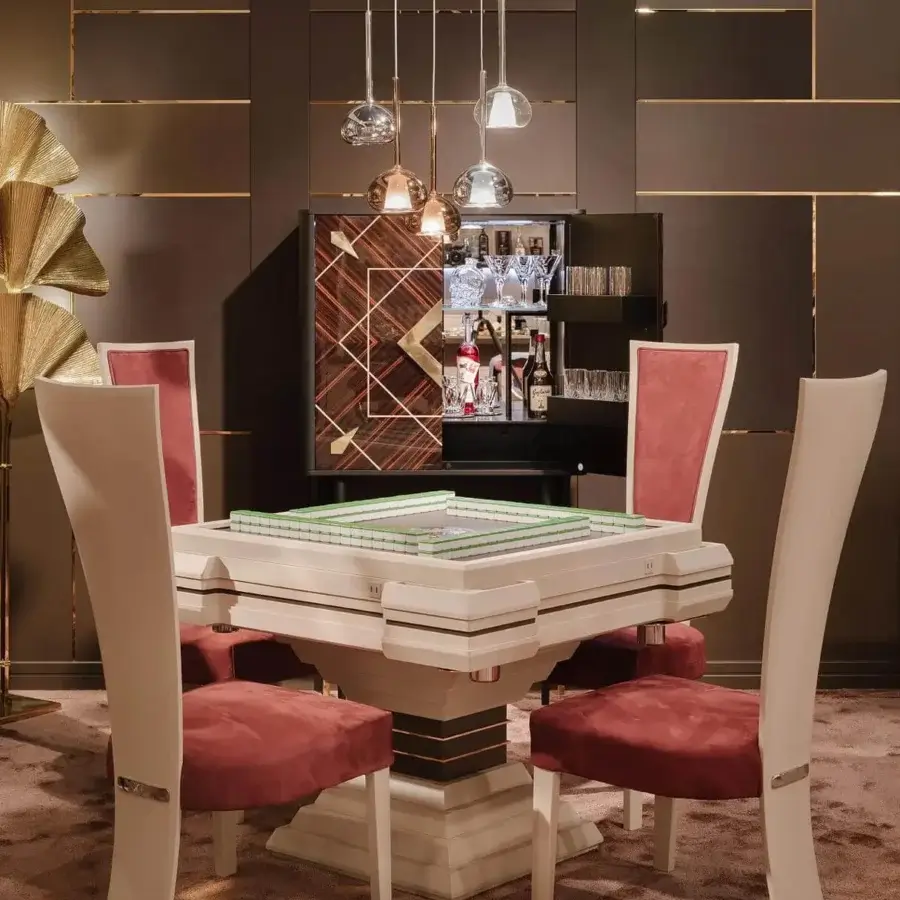 Superior Vismara Spirit bar cabinet with Ebony Makassar and maple wood doors, glossy brass details, plus mirrored interior lighting
