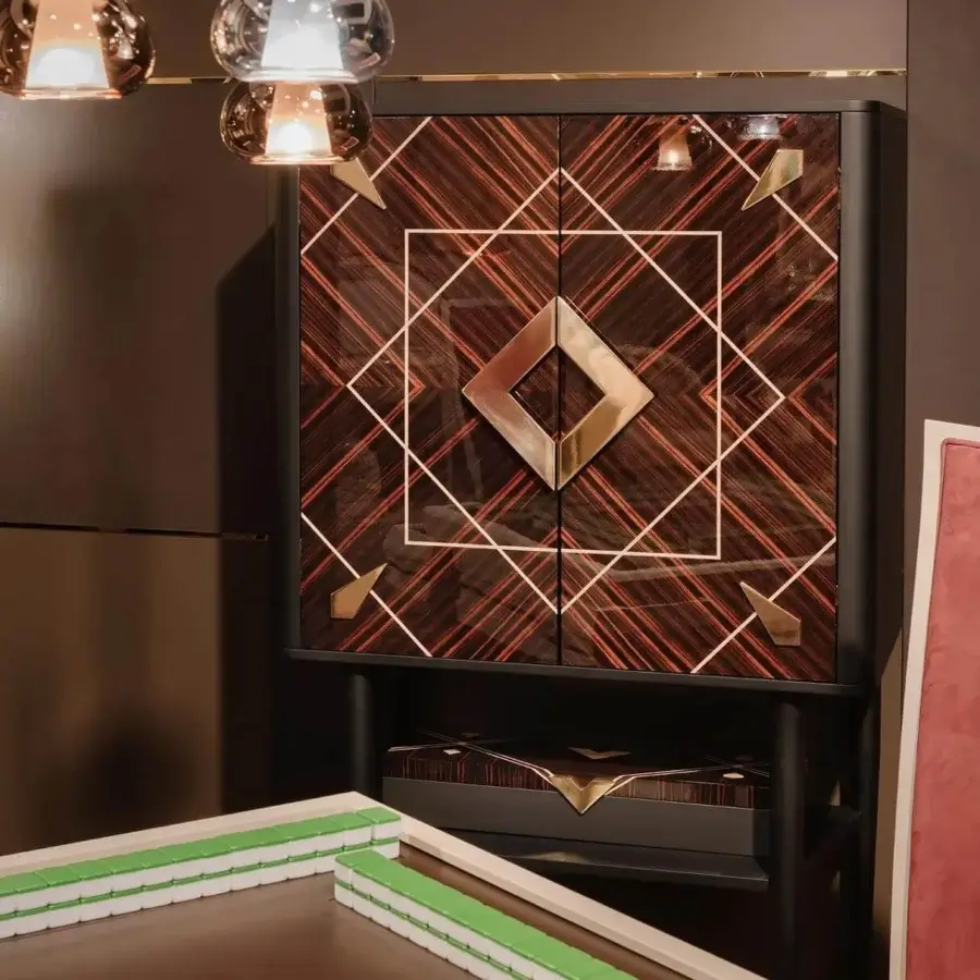 Lavish Vismara Spirit bar cabinet with lacquered Ebony Makassar, maple wood inlay, and glossy brass accents
