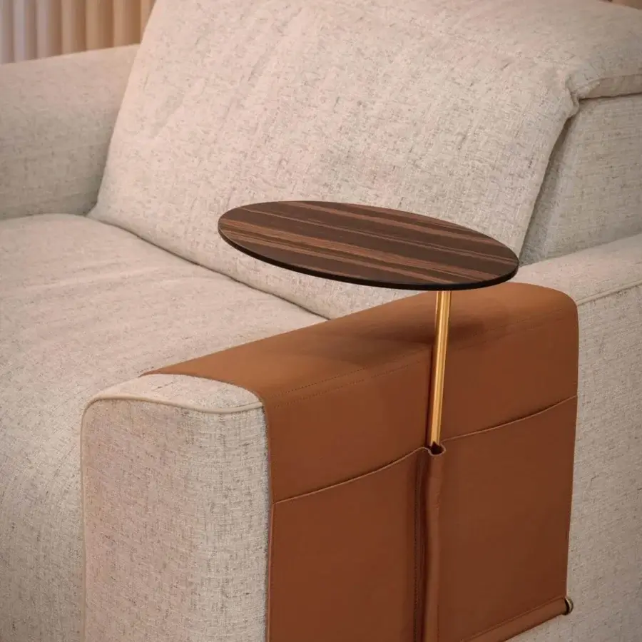 Elegant Vismara Kubrik lounge chair with double reclining mechanism in light neutral textile and brown leather-like armrests with a matte finish