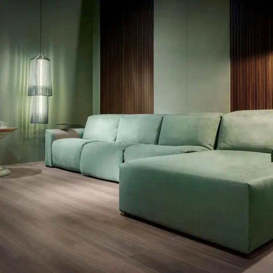 Refined Vismara Kubrik home cinema seating built in muted green textile with a soft matte finish