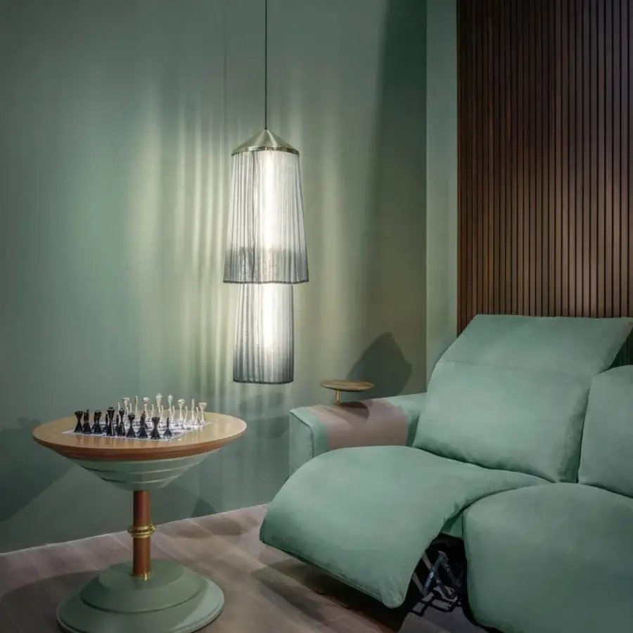 Exceptional Vismara Kubrik home cinema seating built in muted green matte textile with wide armrests and a swivel table