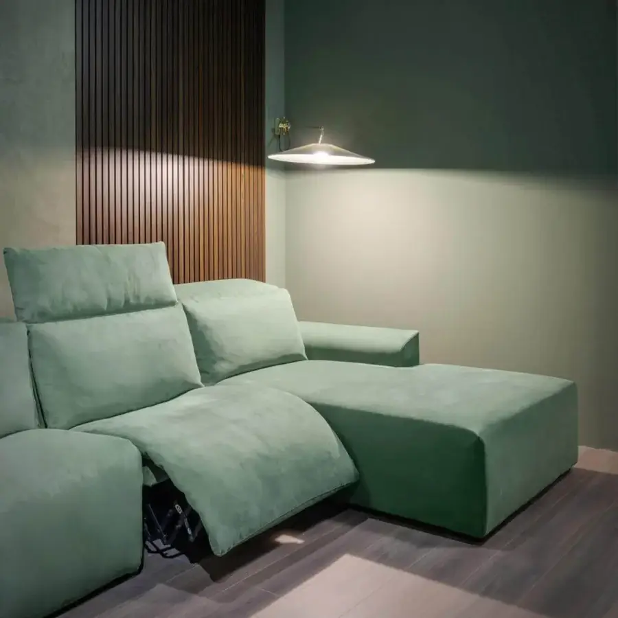 Superior Vismara Kubrik home cinema seating built in plush muted green textile with a double reclining mechanism