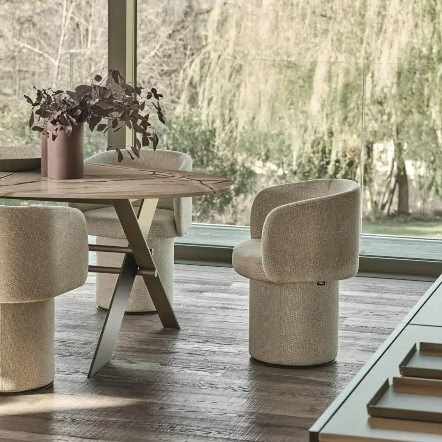 Exclusive Ditre Italia Billie armchair with light beige textile upholstery and rounded sculptural form
