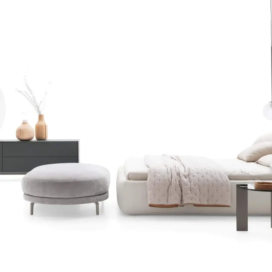 Exclusive Ditre Italia Clip bed with curved headboard and padded base upholstered in refined white fabric with textured finish