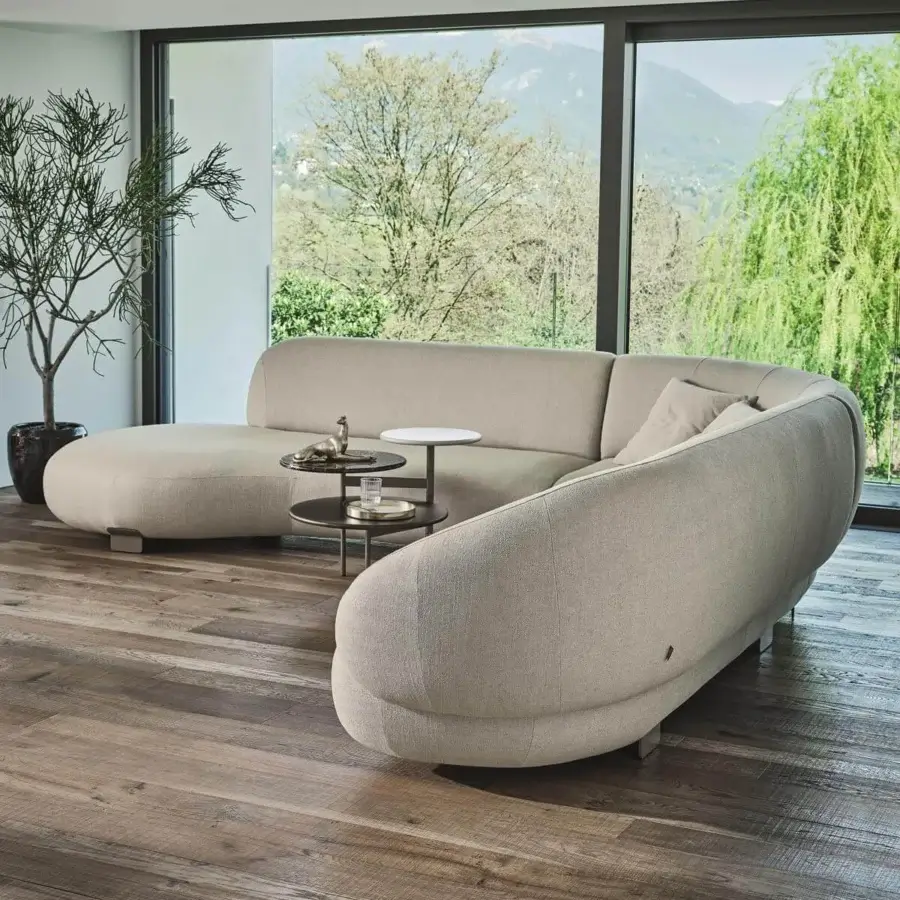 Innovative Ditre Italia Pacific sectional presents fluid seating built with a light beige textured weave upholstery