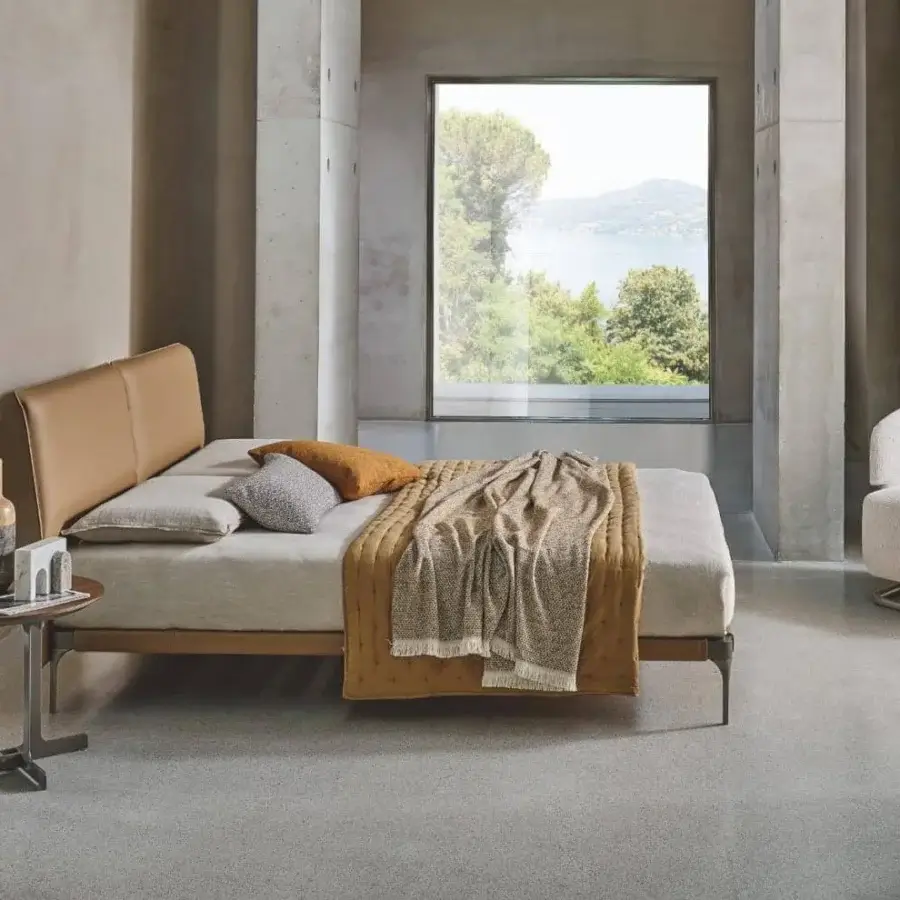 Exclusive Ditre Italia Ada bed with slimline headboard upholstered in warm tan leather and dark metal legs