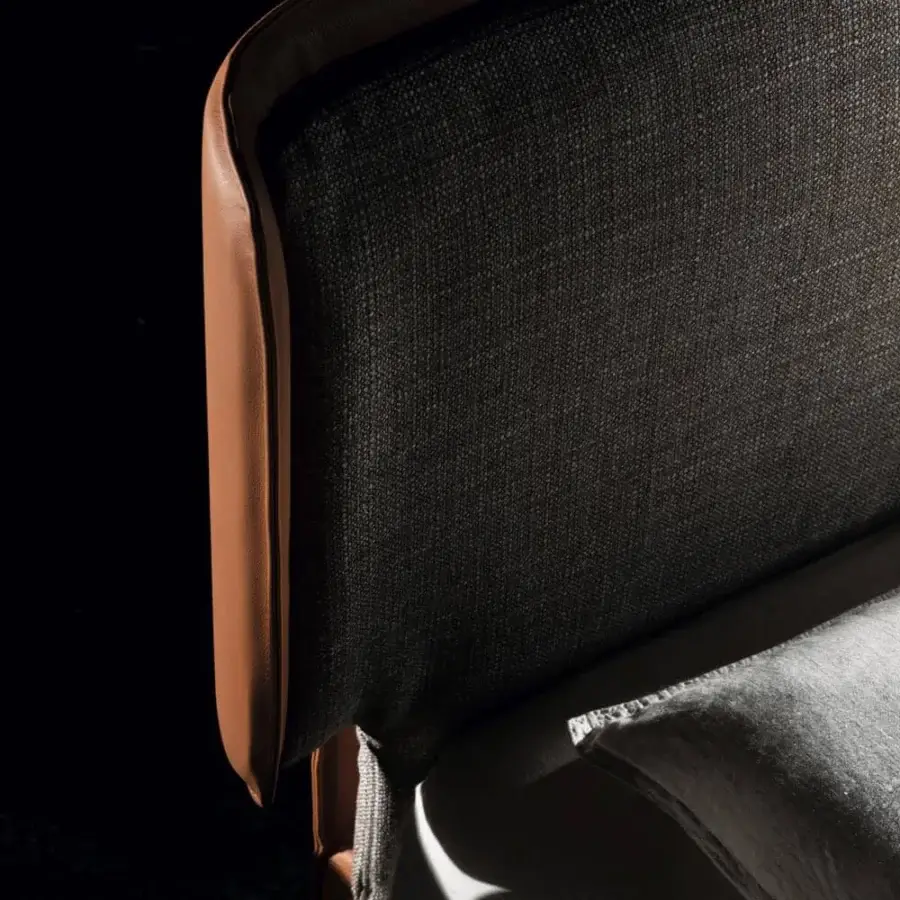 Distinguished Ditre Italia Skin bed with brown leather outlining coarsely woven dark gray fabric padding