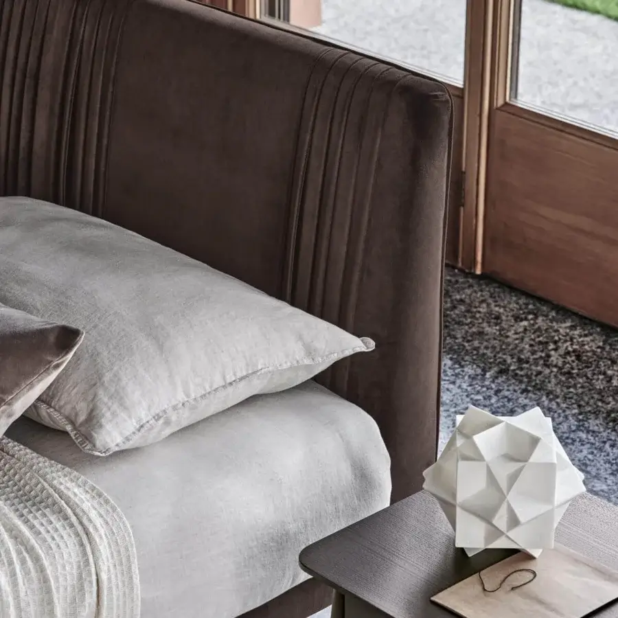 Distinguished Ditre Italia Chloè bed with dark brown textile upholstery and refined pleating for tactile comfort