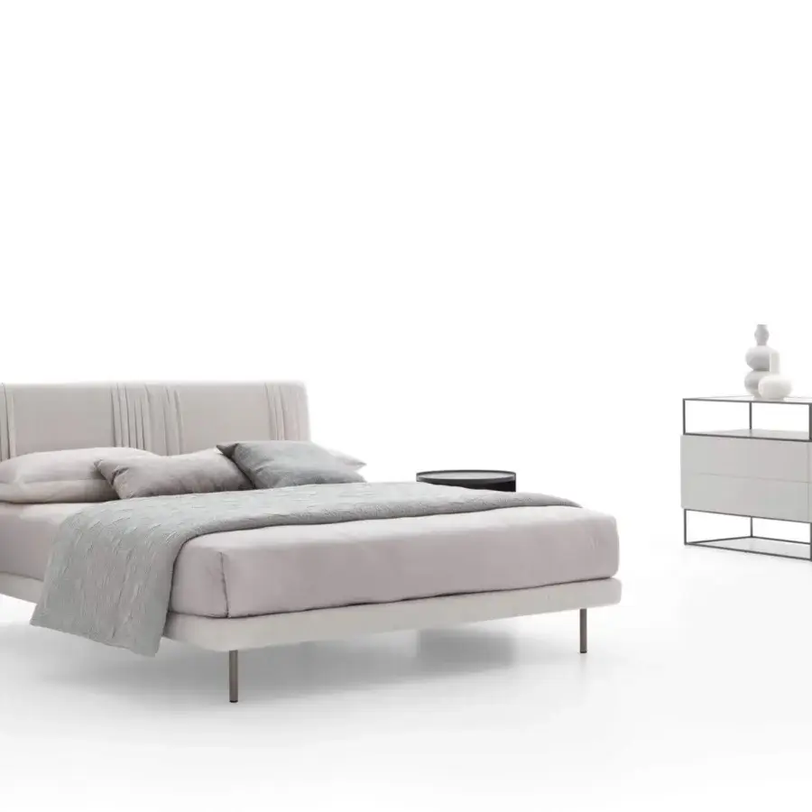 Exclusive Ditre Italia Chloè bed with light gray matte textile upholstery and refined pleating on the headboard