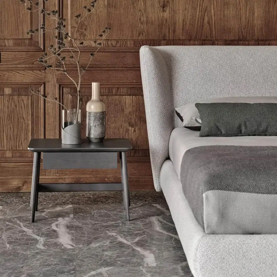 Distinguished Ditre Italia Royal bed with light gray textured textile upholstery and a curved silhouette