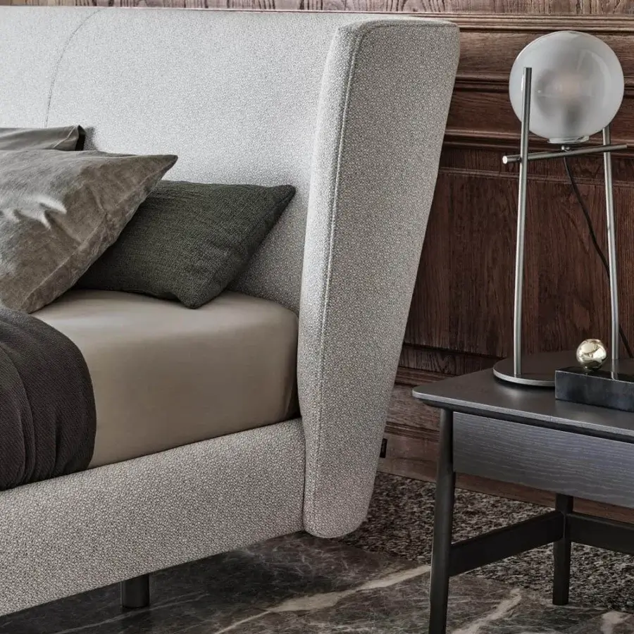 Superior Ditre Italia Royal bed with a light grey textured textile and subtly curved, floating headboard design