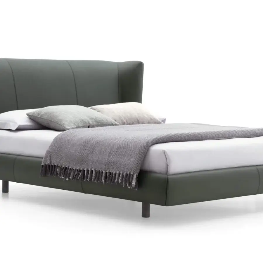 Distinguished Ditre Italia Royal bed with dark green upholstery and smooth matte finish presents reinterpreted proportions