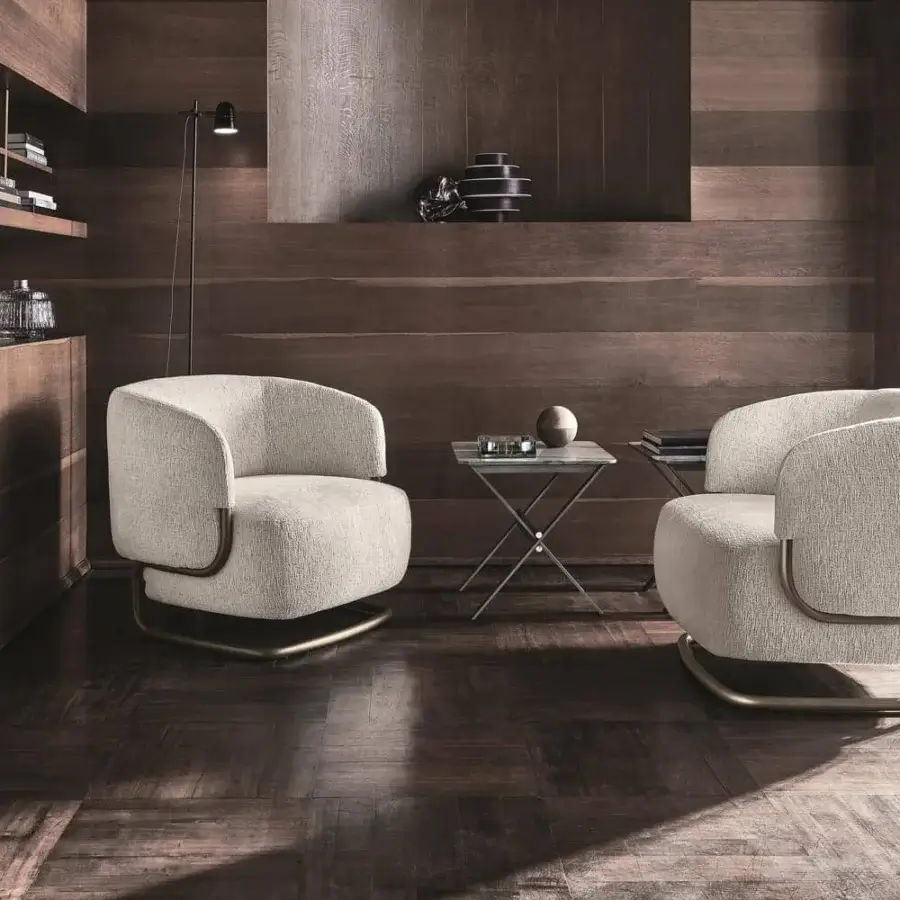 Superior Ditre Italia Marabù lounge chair with neutral beige upholstery and curved metal frame in bronze or gold finish