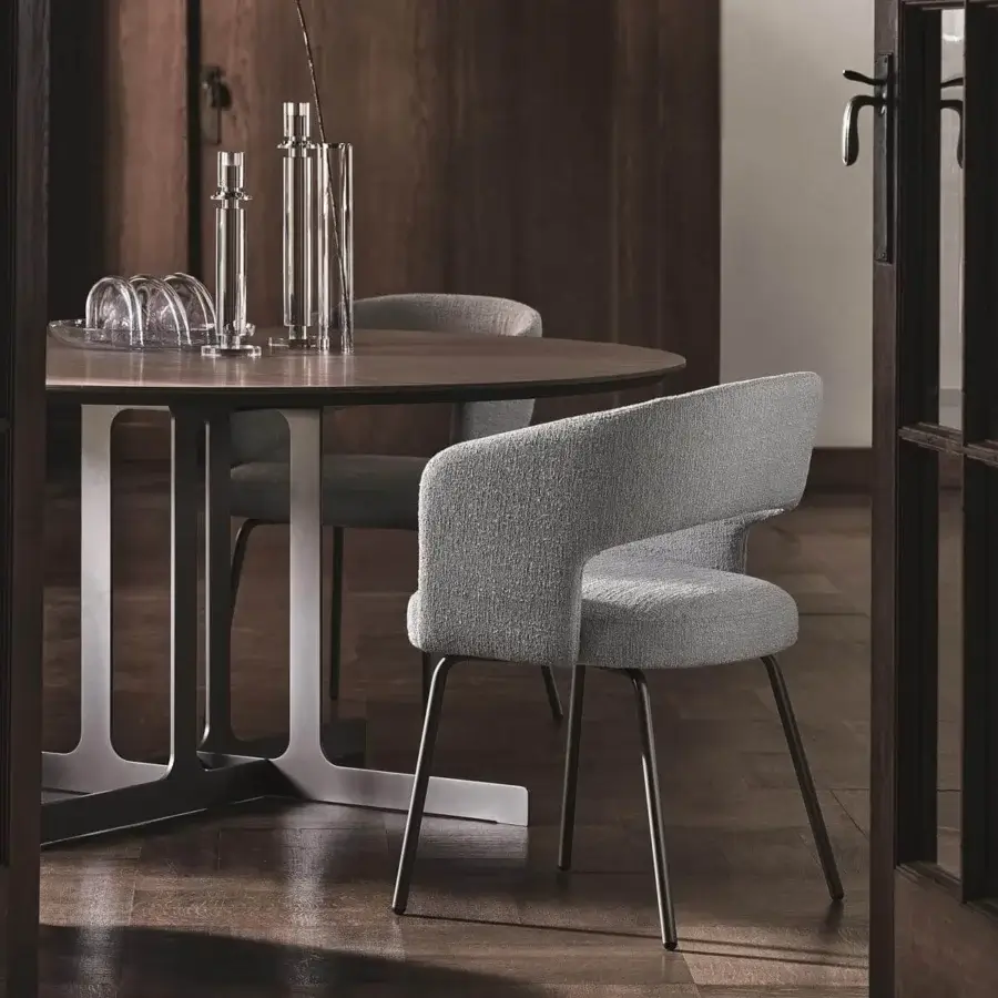 Elegant Ditre Italia 356 armchair with a textured gray textile shell and varnished metal legs