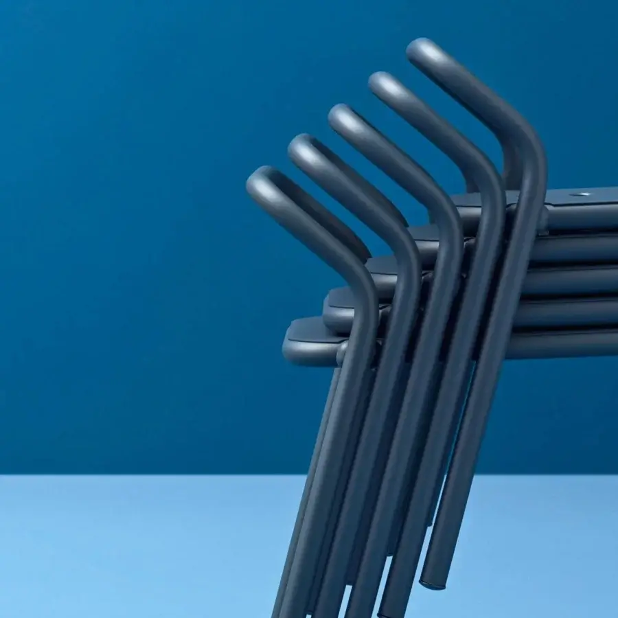 Exclusive Varaschin Noss chair crafted in Italy with uniform blue-grey powder-coated aluminum seat and structure