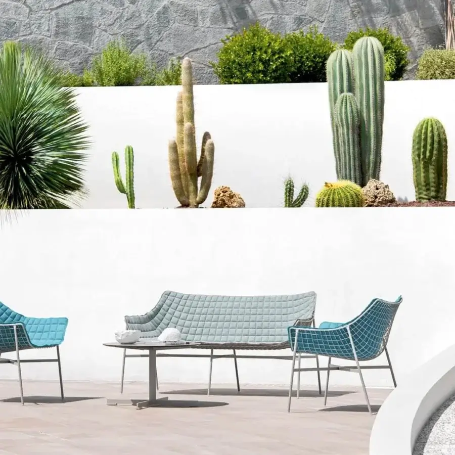 Distinctive Varaschin Summer Set sofa with a powder-coated steel frame and light blue-gray quilted cushions built with a magnetic system