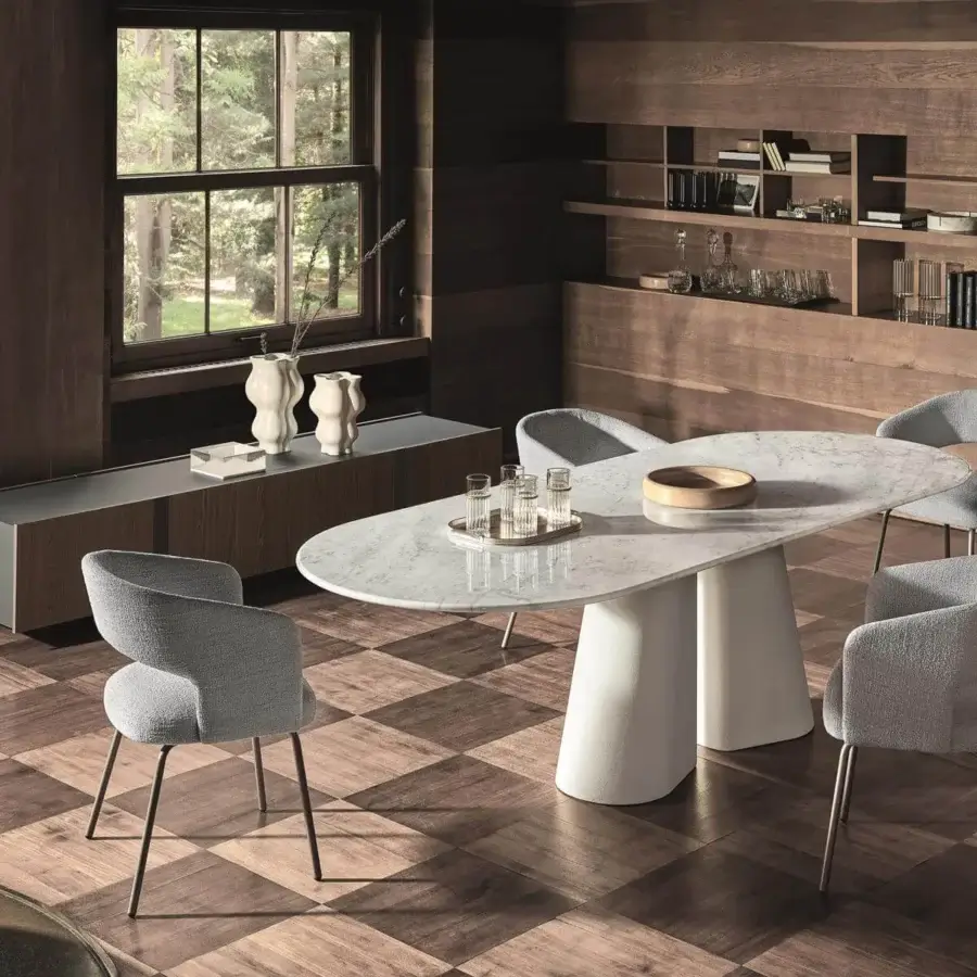 Sophisticated Ditre Italia Pillar table with a minimalist oval tabletop and sculptural cylindrical base in a light marble-like finish