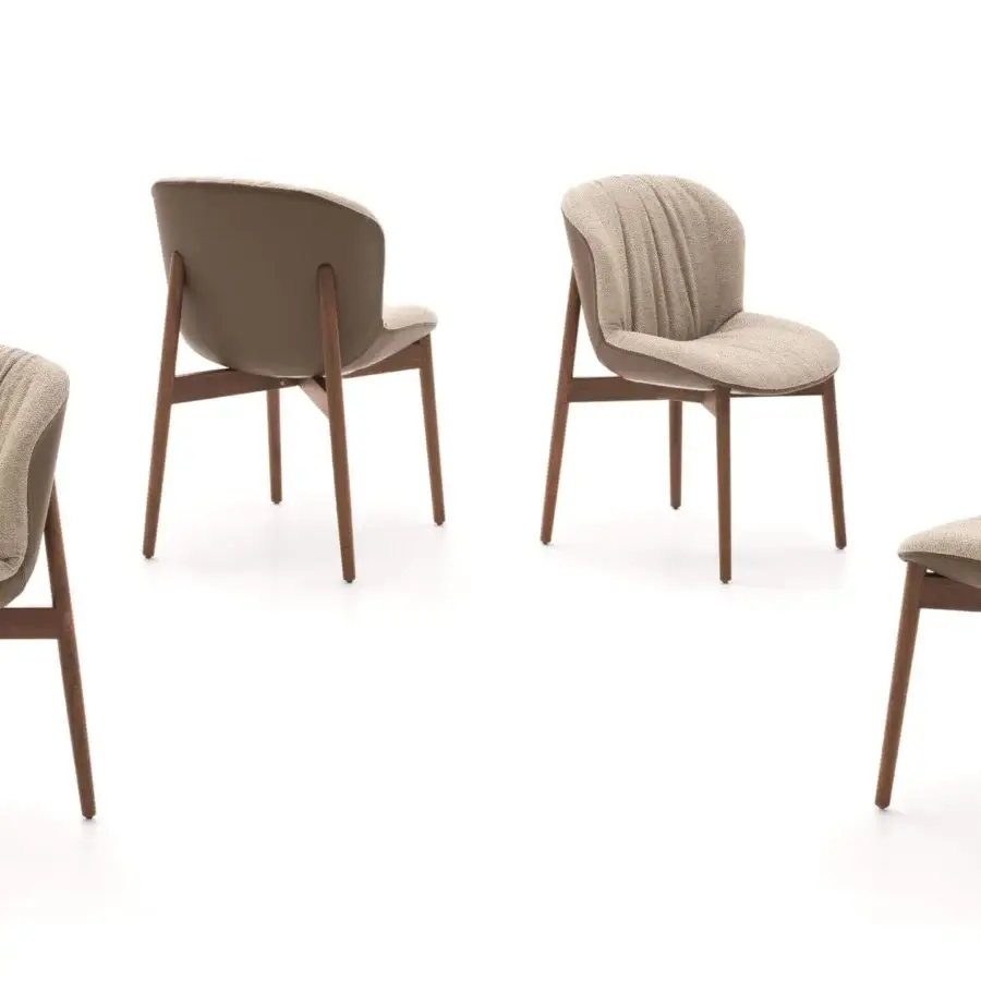 Distinguished Ditre Italia Bounty chair with light beige textile and smooth matte wood frame offering balanced form