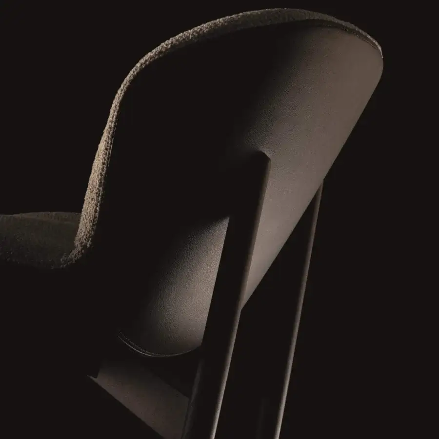 Exceptional Ditre Italia Bounty chair crafted with dark muted brown textile and smooth leather-like material, presenting a uniform chromatic finish