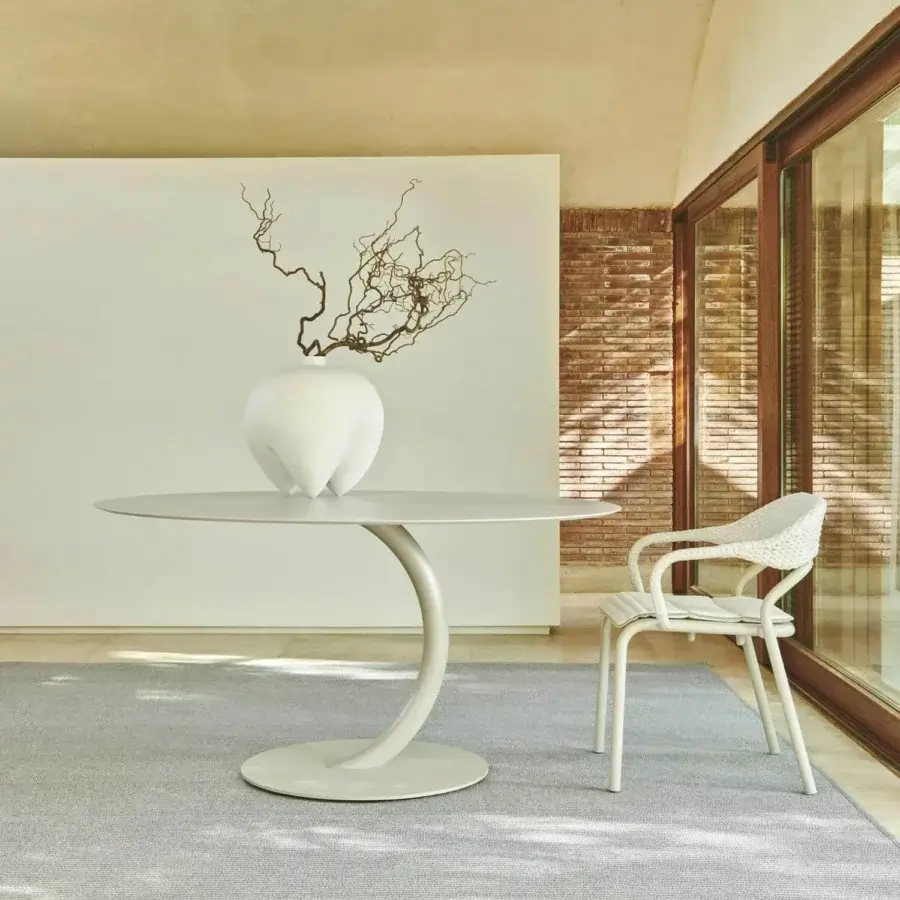 Superior Varaschin Flexion table with light gray HPL top and powder-coated steel base built for outdoor durability