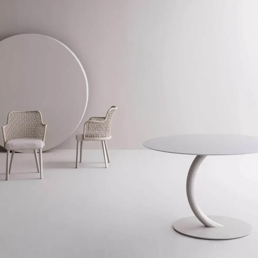Innovative Varaschin Flexion table with light gray HPL top and curved steel base built with a C5M protective cycle