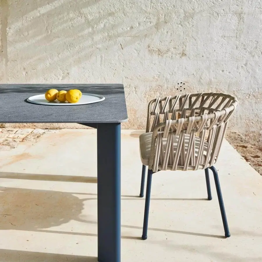 Elegant Varaschin Plinto table with rectangular dark grey HPL top and bluish-grey powder coated aluminum leg