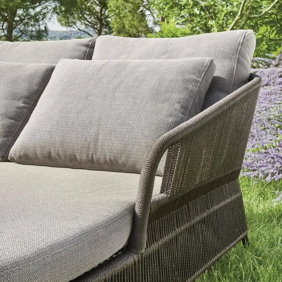 Sophisticated Varaschin Cricket lounger with dark brown hand-woven synthetic fiber and light gray seat cushions, crafted in Italy