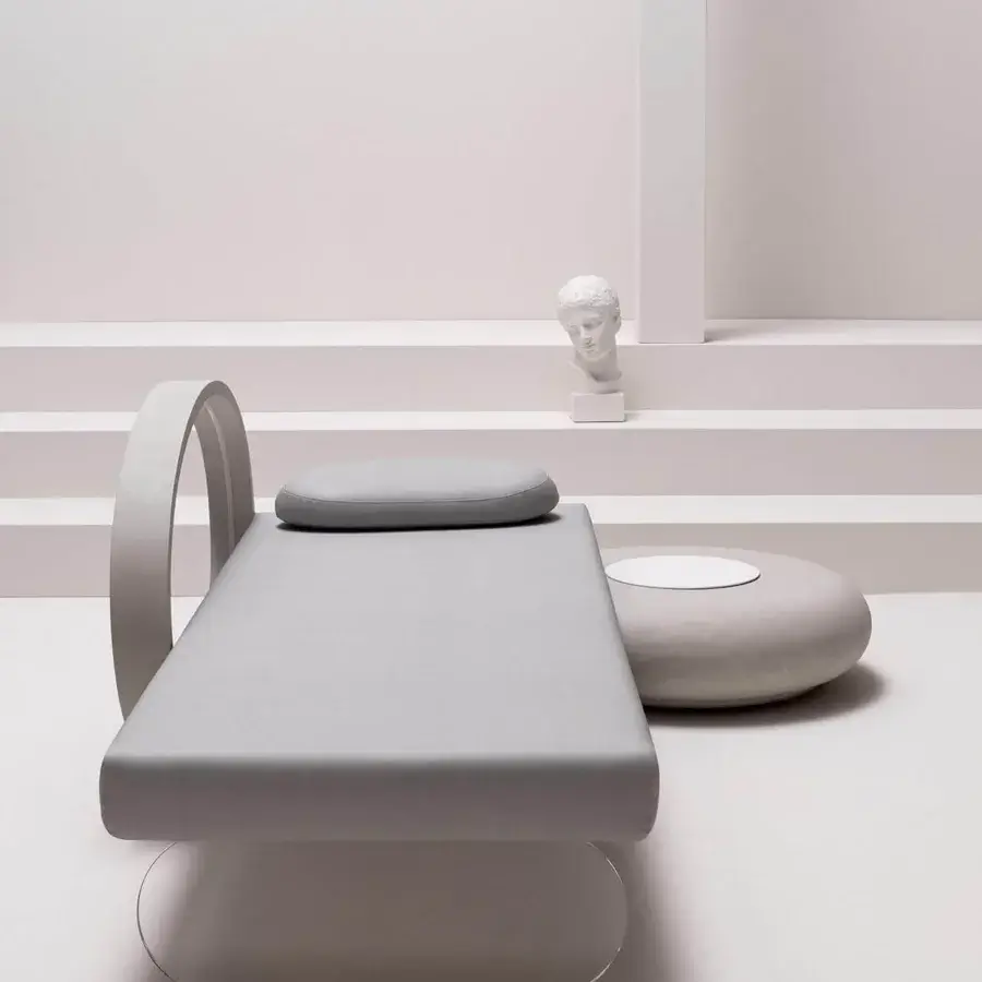 Innovative Varaschin Wellness Therapy daybed with a curved transparent plexiglass base and matte gray finish