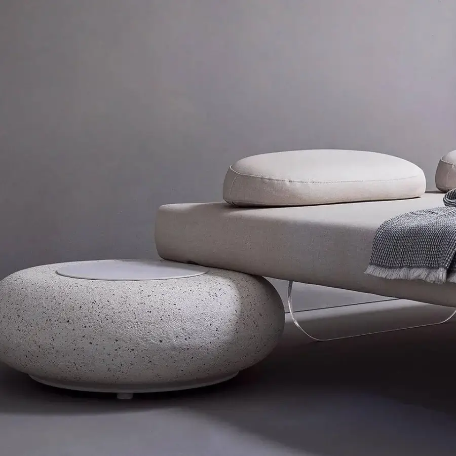 Innovative Varaschin Wellness Therapy bed with knitted blanket and transparent plexiglass supports in light beige textiles