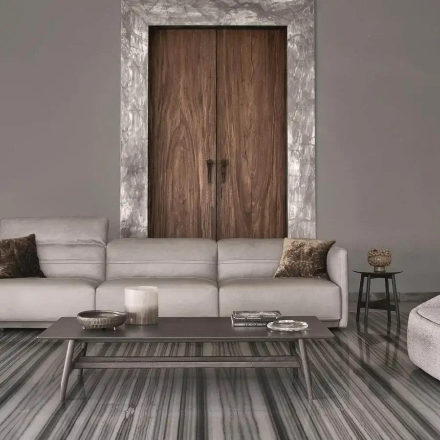 Exclusive Ditre Italia Bend lounge chair upholstered in light gray fabric with a subtly textured finish