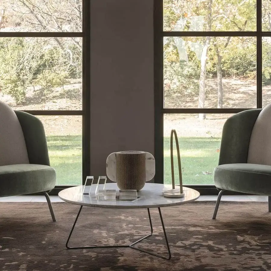 Superior Ditre Italia Lucia lounge chair with curved textile upholstery and dark green armrests built with thin metal legs