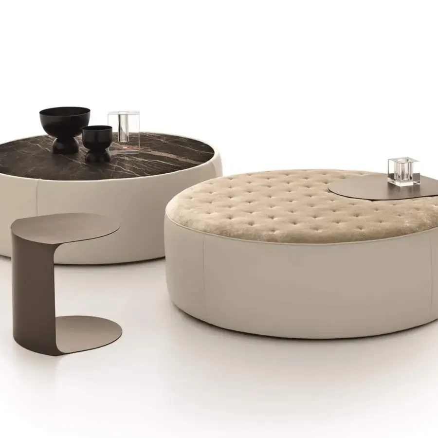 Distinctive Ditre Italia Clip coffee table with round stoneware top and dark gray upholstered base