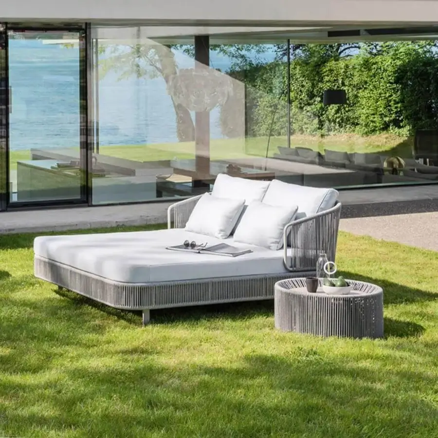 Refined Varaschin Tibidabo lounger with aluminum frame and manually woven Perla Rope in Silk Grey finish offers exceptional comfort with plush cushions