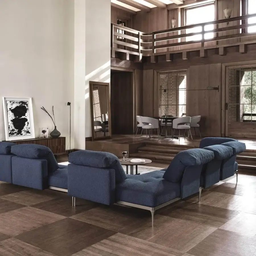 Distinguished Ditre Italia Ada sectional with geometric forms and rounded cushions upholstered in textured blue textile with slender metal legs