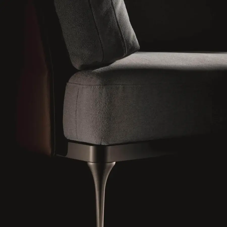 Exceptional Ditre Italia Ada sectional with a dark gray textured weave, reddish-brown panel and distinctive dark metallic trumpet legs