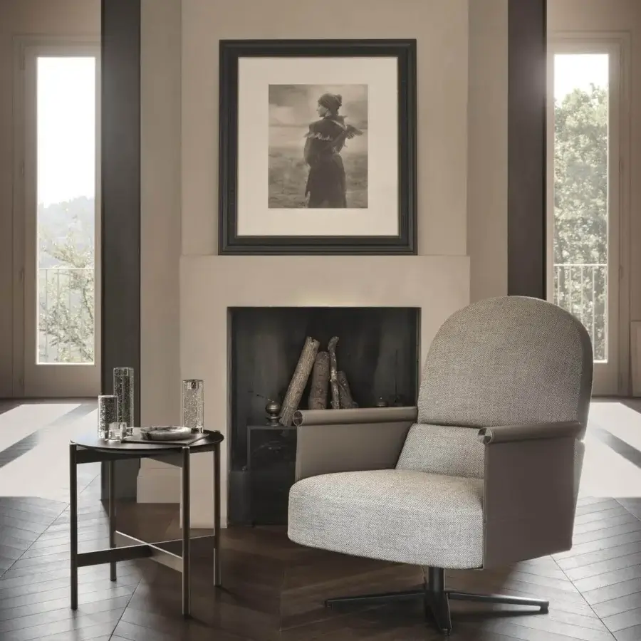 Sophisticated Ditre Italia Beyl lounge chair with light gray textile upholstery and warm gray leather armrests built with a painted metal base