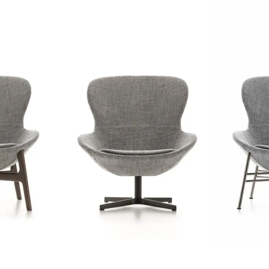 Distinguished Ditre Italia Round Lounge Chair with enveloping curved back upholstered in textured gray fabric and dark-toned wooden legs
