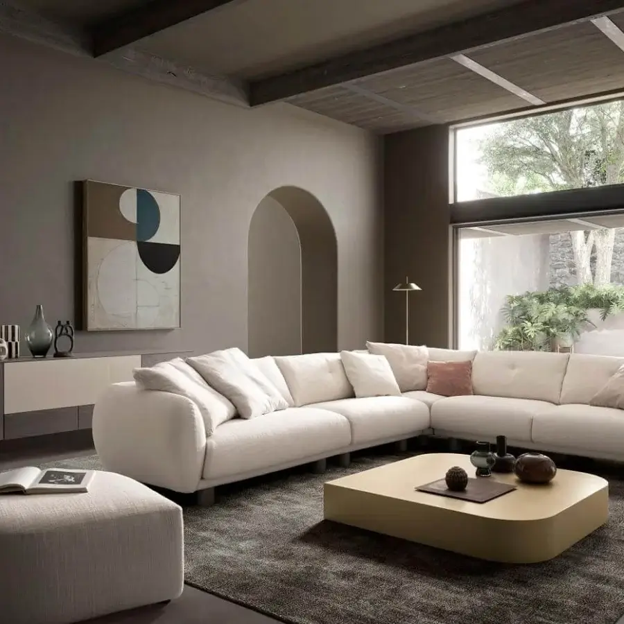 Elegant Presotto Drop ottoman with simple geometric form upholstered in light beige textile and matte finish