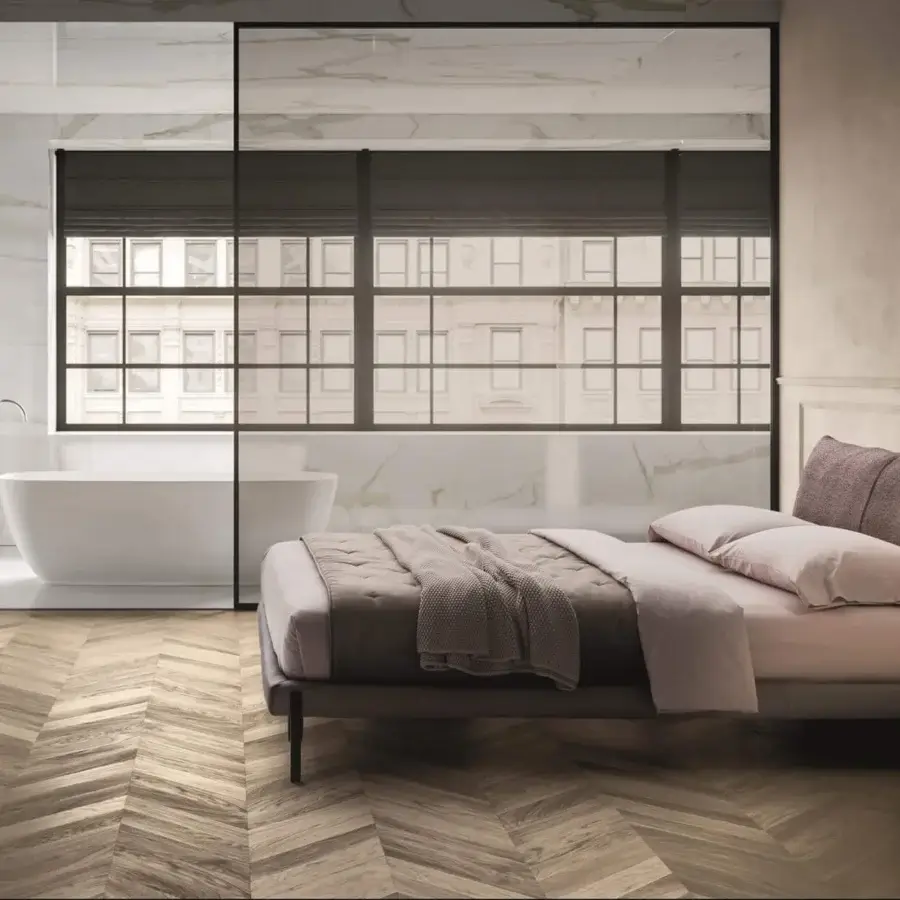 Sophisticated Ditre Italia Kim bed with muted gray frame, mauve textile headboard and sleek dark metal feet