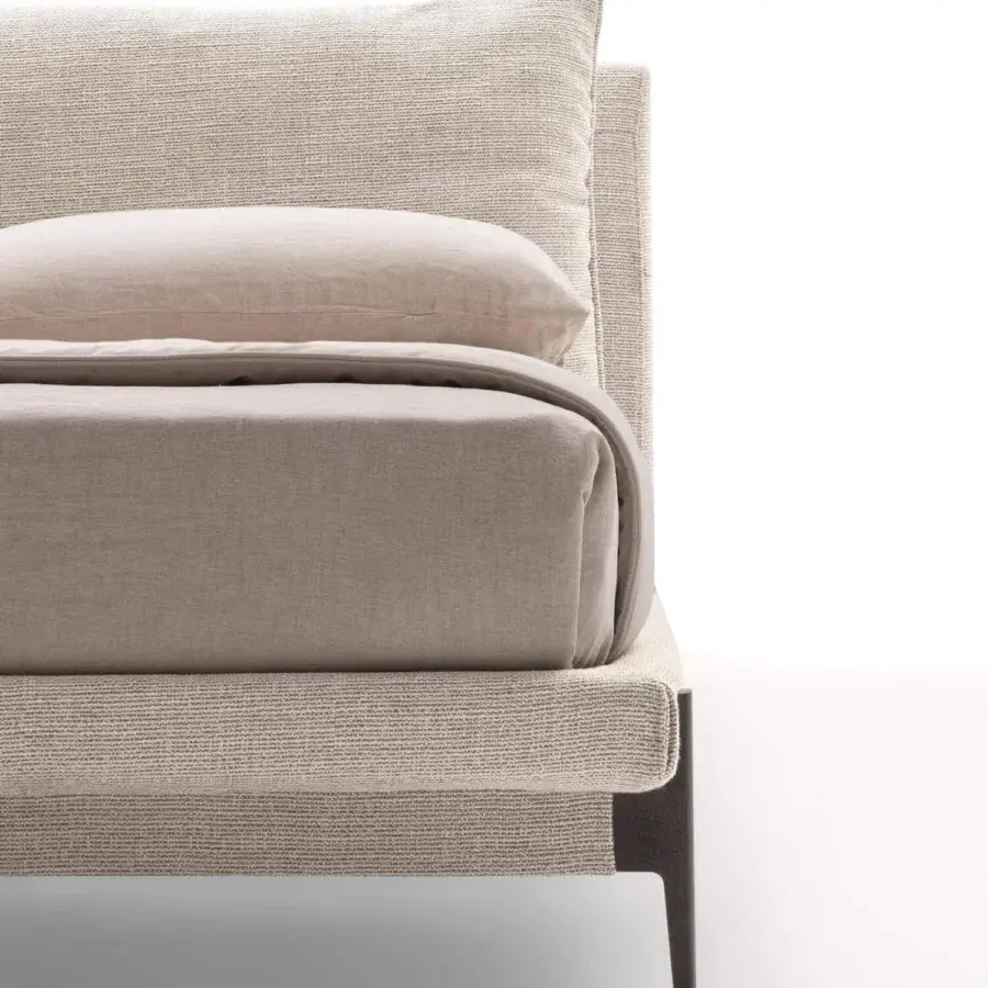 Distinguished Ditre Italia Kim bed with neutral beige textured upholstery and dark, set-back legs creating a floating effect