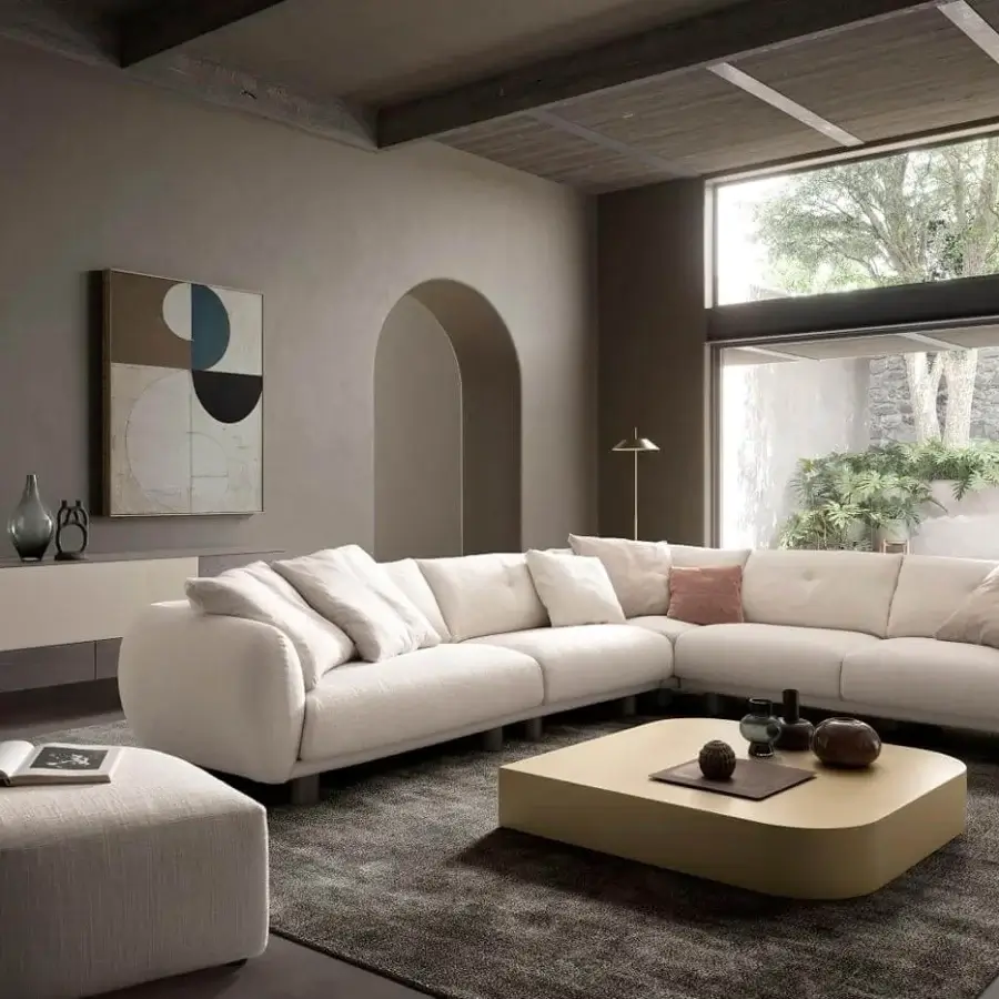Elegant Presotto Drop coffee table with curved lines and muted yellow matt lacquered finish crafted in Italy