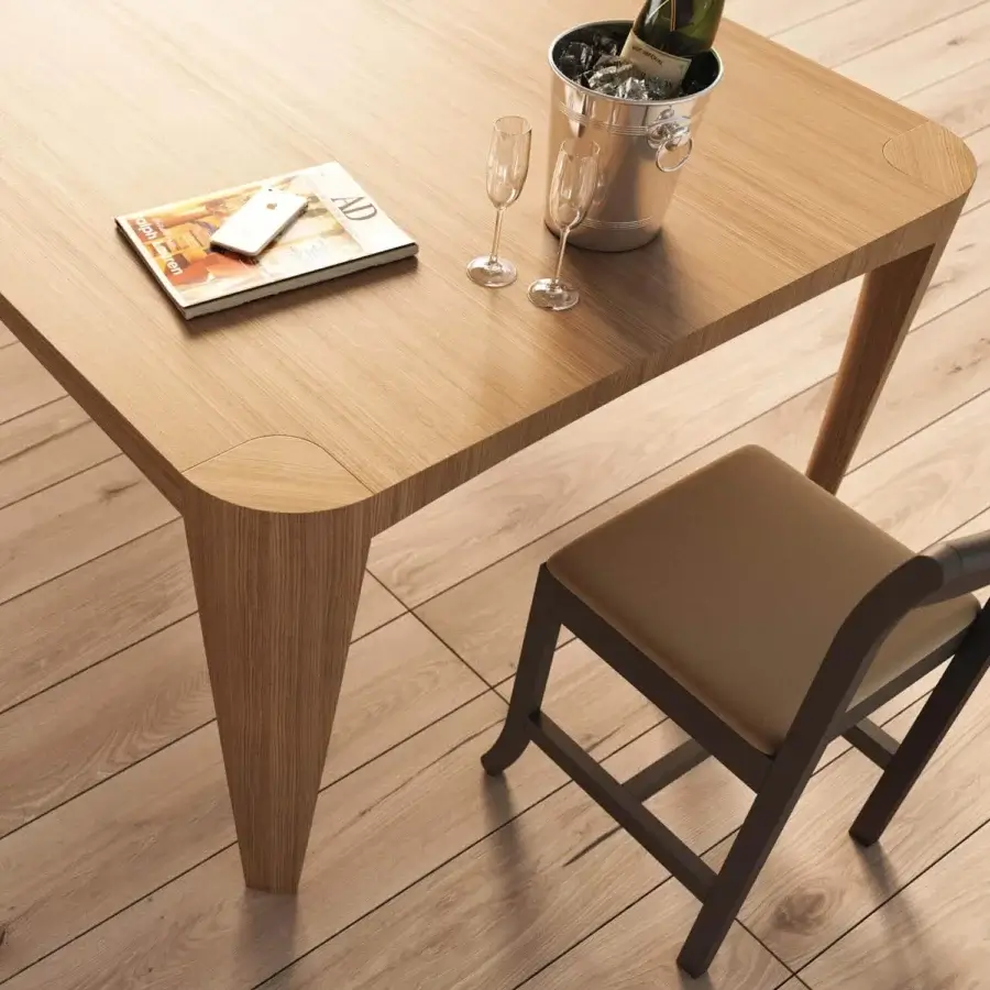 Distinguished Presotto Terra table crafted in natural oak with elegantly shaped edges and tapered legs