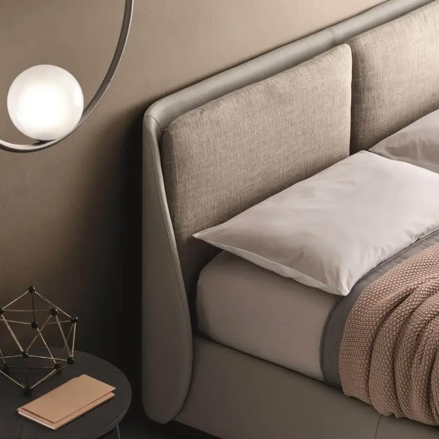 Sophisticated Ditre Italia Bend bed with woven light beige upholstery and smooth light gray framing built with comfortable cushions