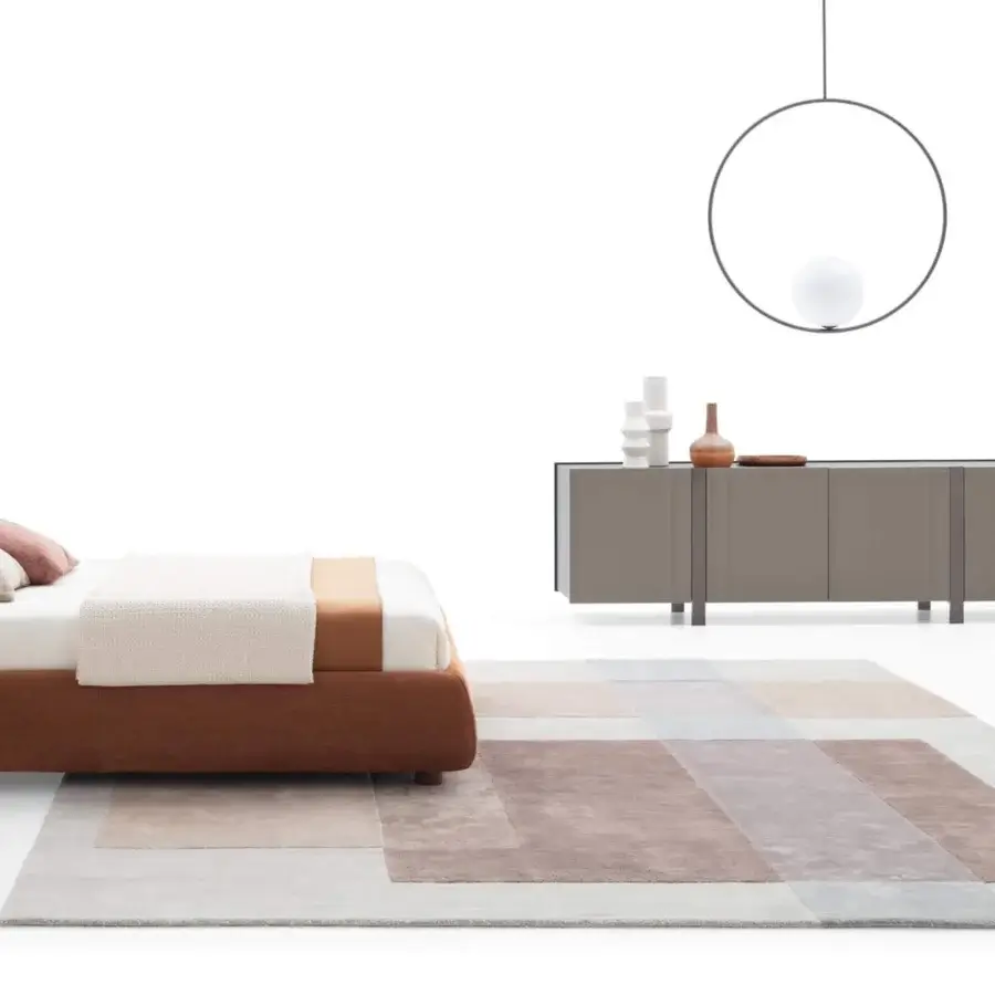 Elegant Ditre Italia Marabù lounge chair with reddish-brown upholstery and curved tubular metal frame