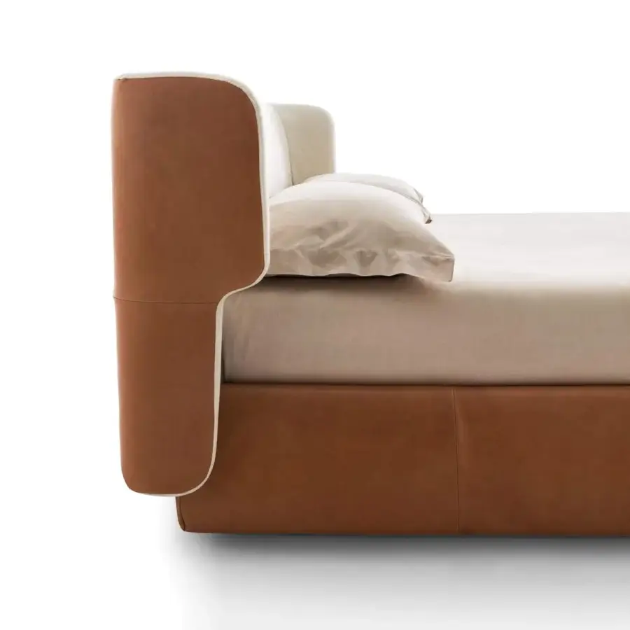 Superior Ditre Italia Claire bed with wraparound headboard upholstered in warm brown leather-like material and cream accents