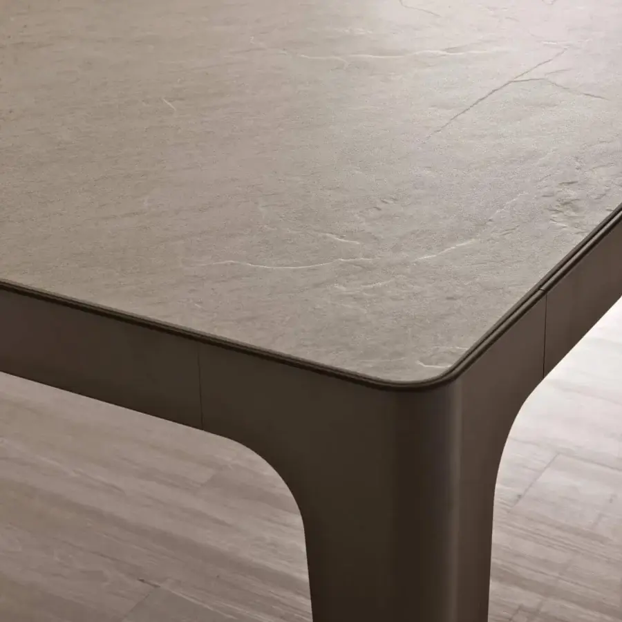 Distinguished Presotto Grand More table with rectangular ceramic top and rounded legs in a neutral gray-brown tone with matte finish