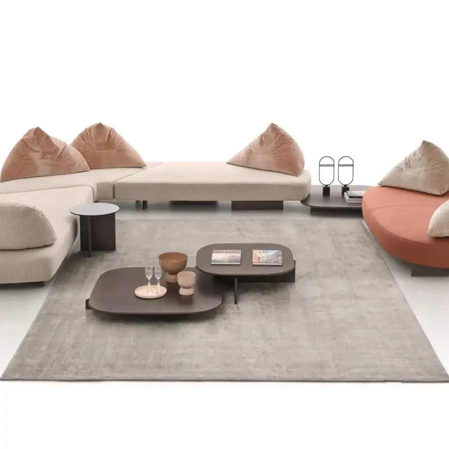 Elegant Ditre Italia Papilo sectional with light beige textile upholstery, contrasting cushions and dark-toned base