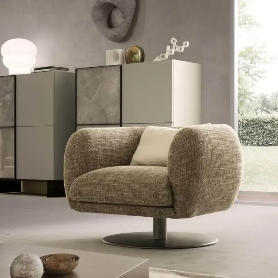 Exceptional Presotto Bali lounge chair upholstered in textured brown fabric with a light beige cushion and Peltro painted base